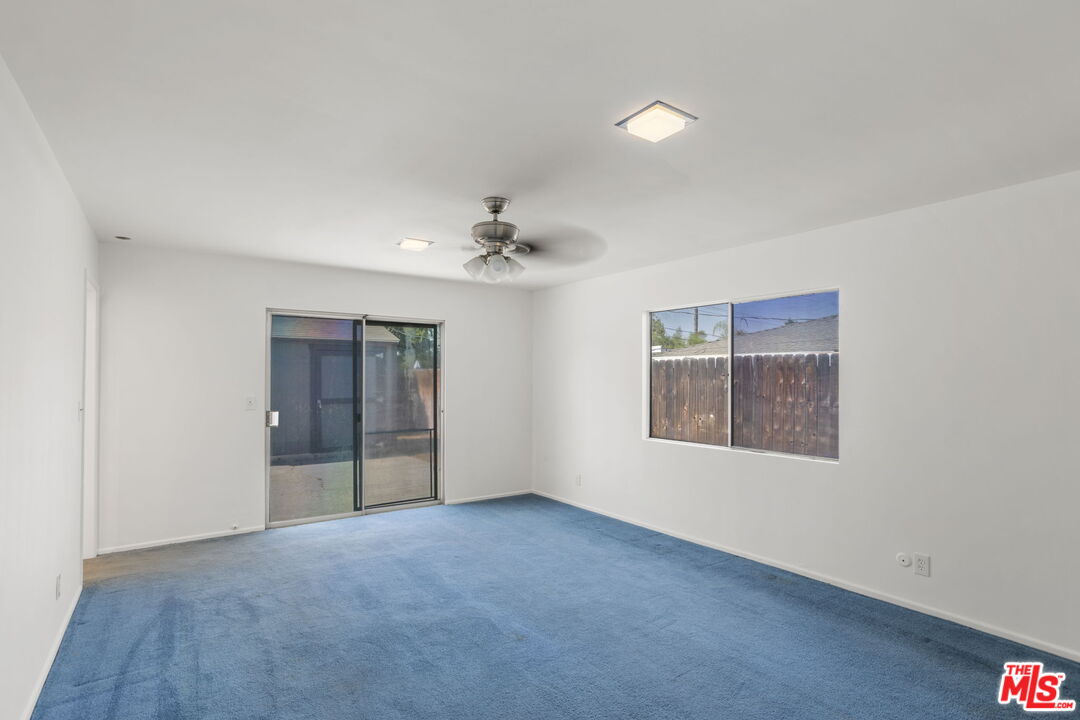 5279 Falkirk Avenue Riverside, CA 92506 - Photo 9 of 44 a view of an empty room with a window