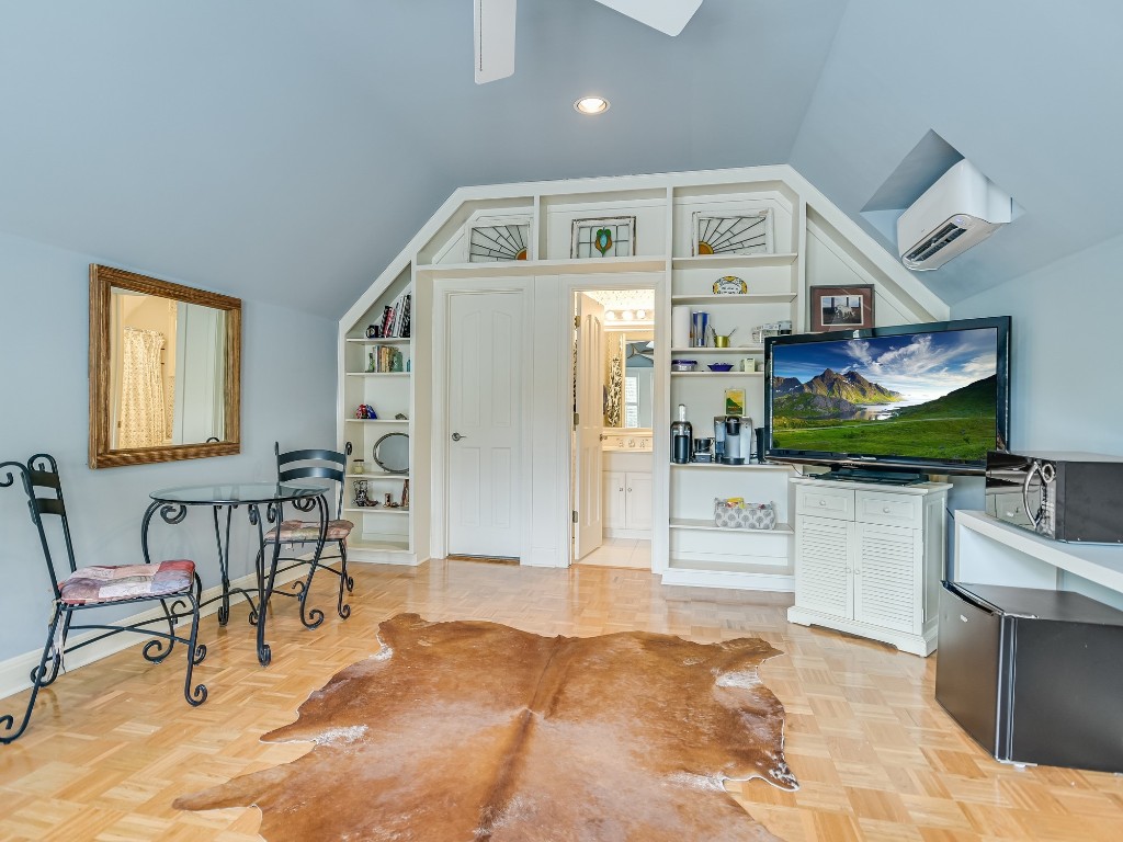 2510 West 35th Street Austin, TX 78703 - Photo 21 of 25 a living room with stainless steel appliances kitchen island granite countertop furniture and a kitchen view