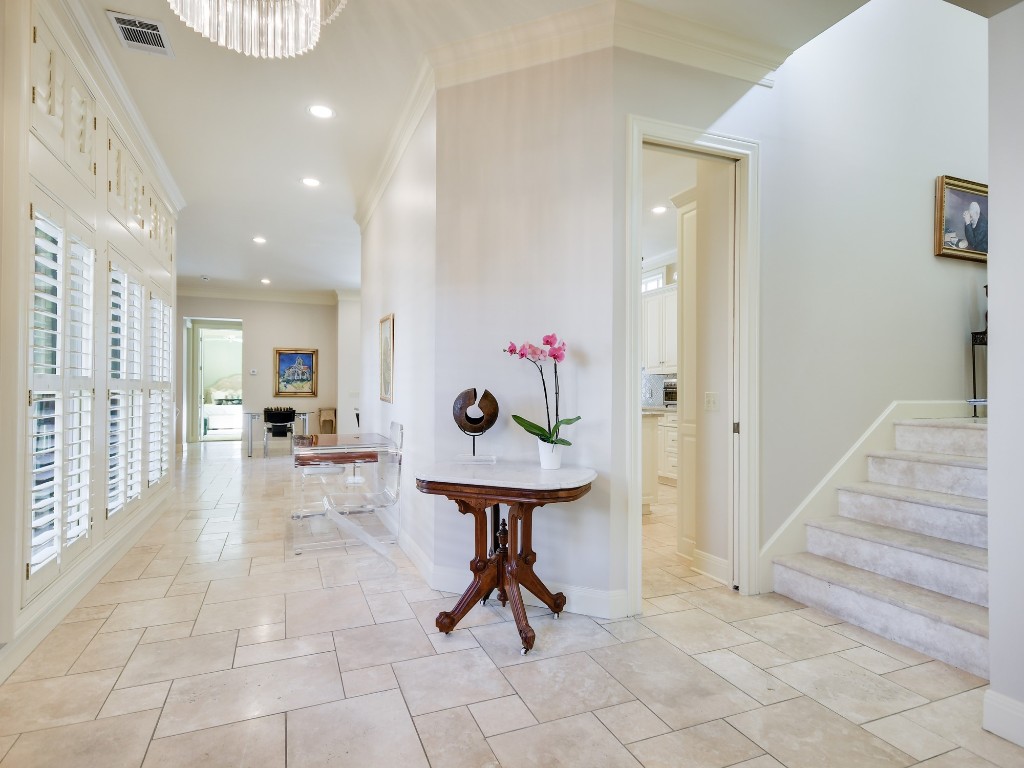 2510 West 35th Street Austin, TX 78703 - Photo 3 of 25 a view of a hallway with furniture and a chandelier