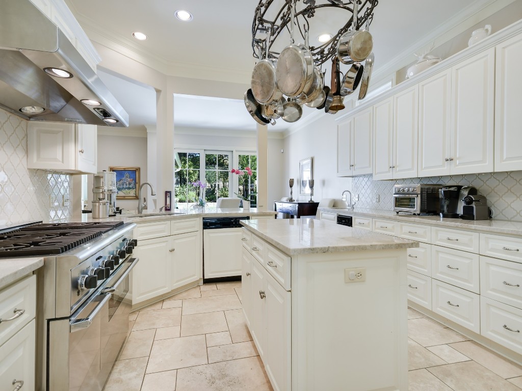 2510 West 35th Street Austin, TX 78703 - Photo 9 of 25 a kitchen with cabinets and stainless steel appliances