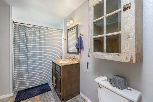 a bathroom with a sink and a toilet
