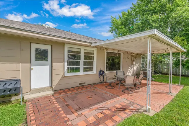 a house with yard in front of it