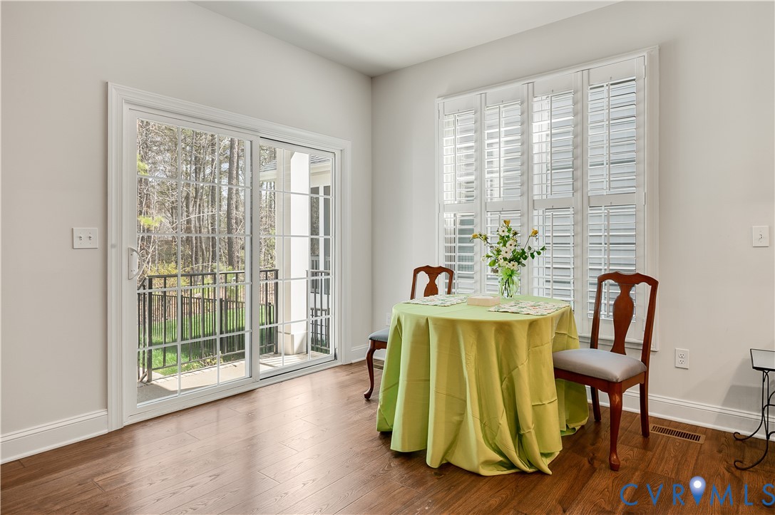 9419 Widthby Road Chesterfield, VA 23832 - Photo 12 of 23 a view of a dining room with furniture and a window