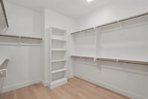 a view of an empty walk in closet
