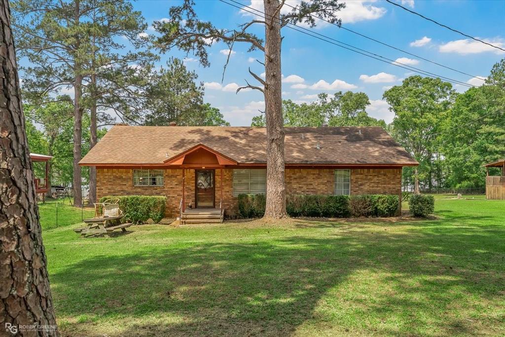 212 Pine Street Heflin, LA 71039 - Photo 1 of 1 a view of a house with a yard