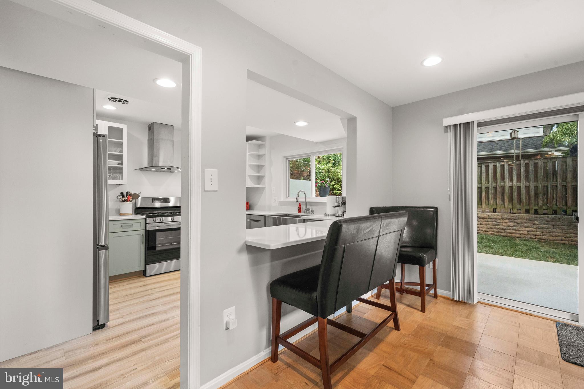 8414 Thames Street Springfield, VA 22151 - Photo 11 of 45 a view of a dining room with furniture and window