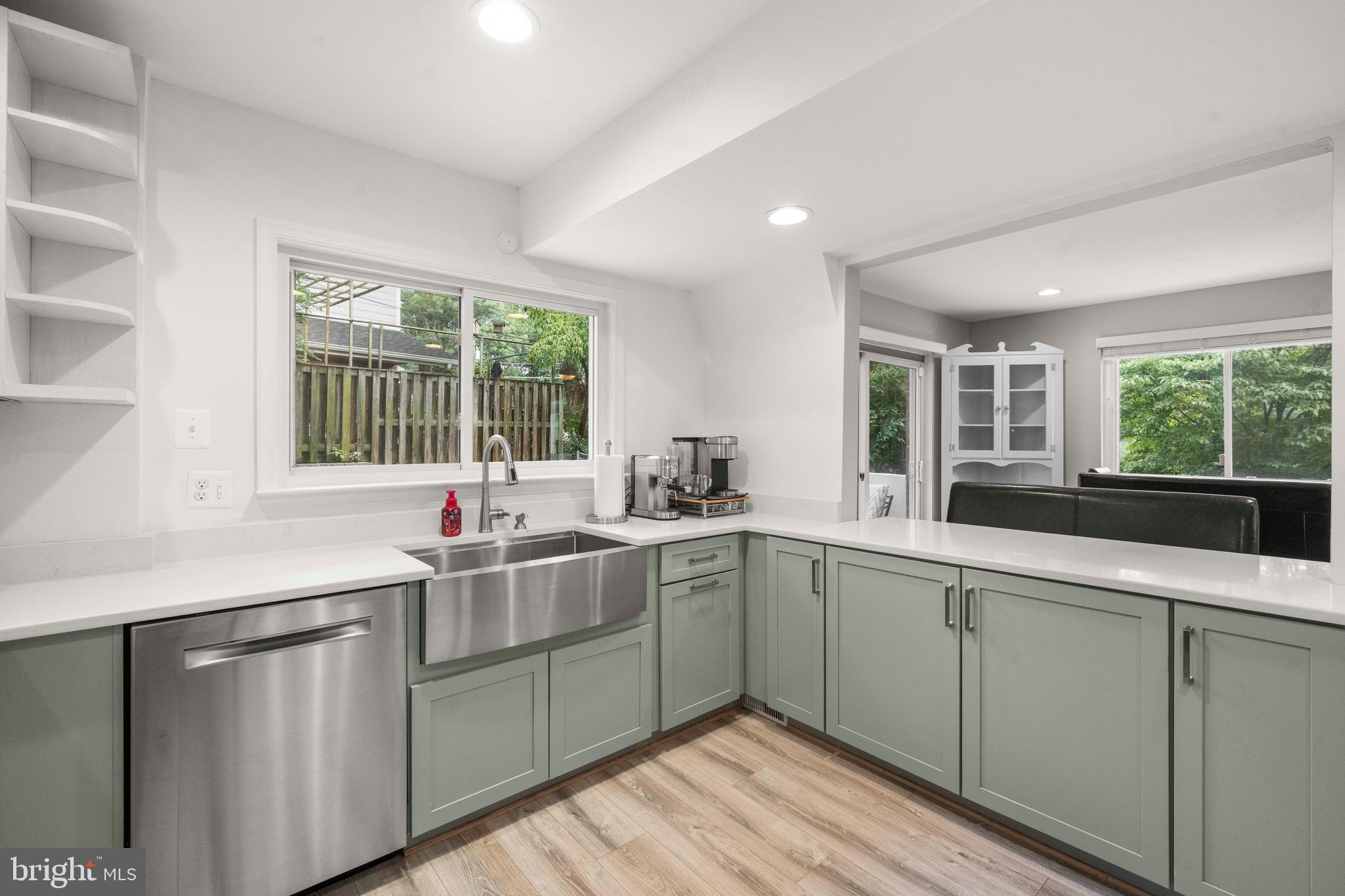 8414 Thames Street Springfield, VA 22151 - Photo 14 of 45 a kitchen with a sink and large window