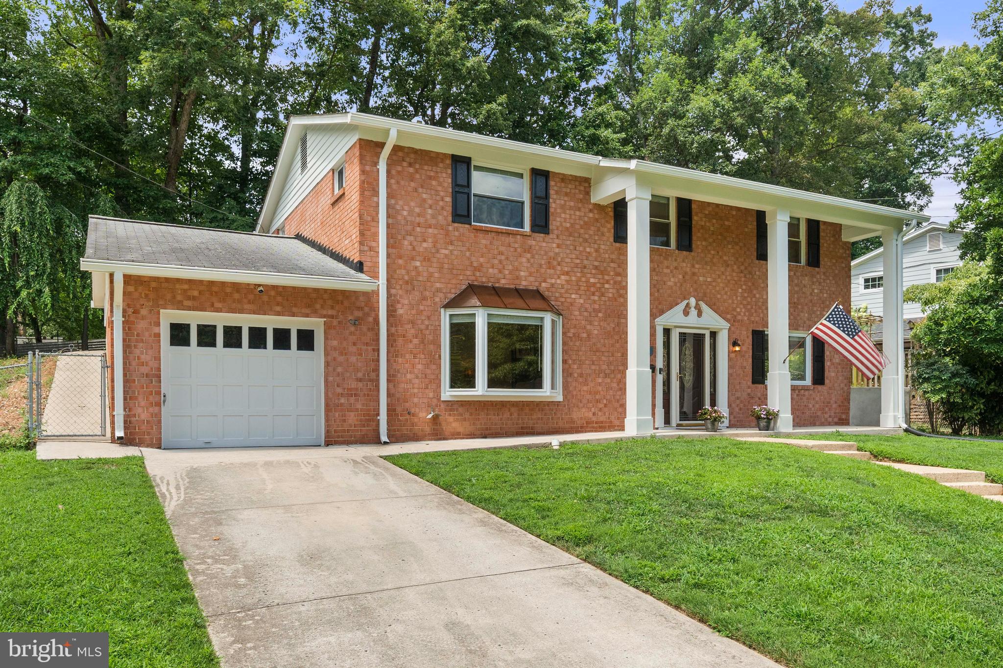 8414 Thames Street Springfield, VA 22151 - Photo 2 of 45 a front view of house with yard and green space