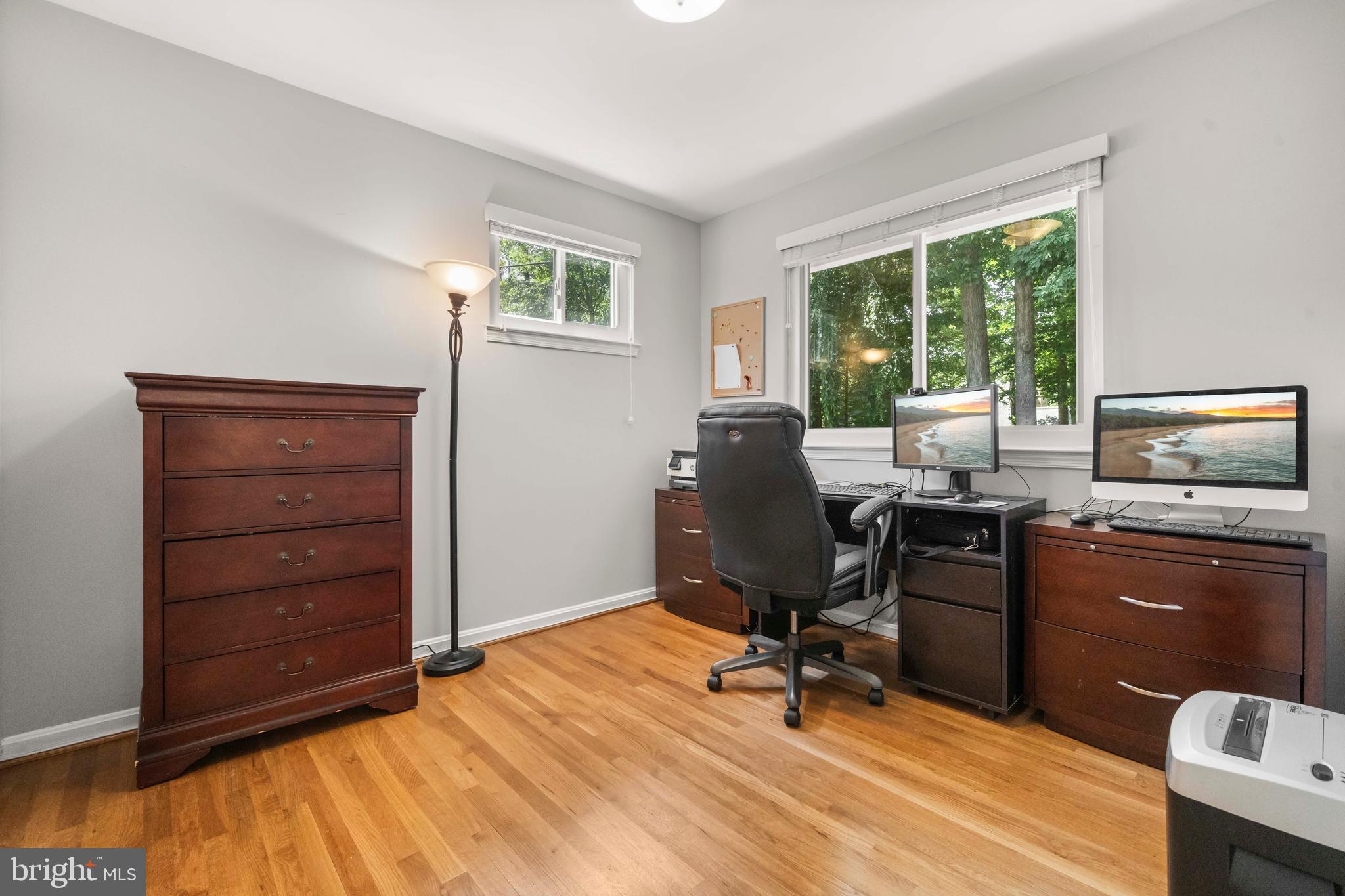 8414 Thames Street Springfield, VA 22151 - Photo 25 of 45 a view of a workspace with furniture and a window