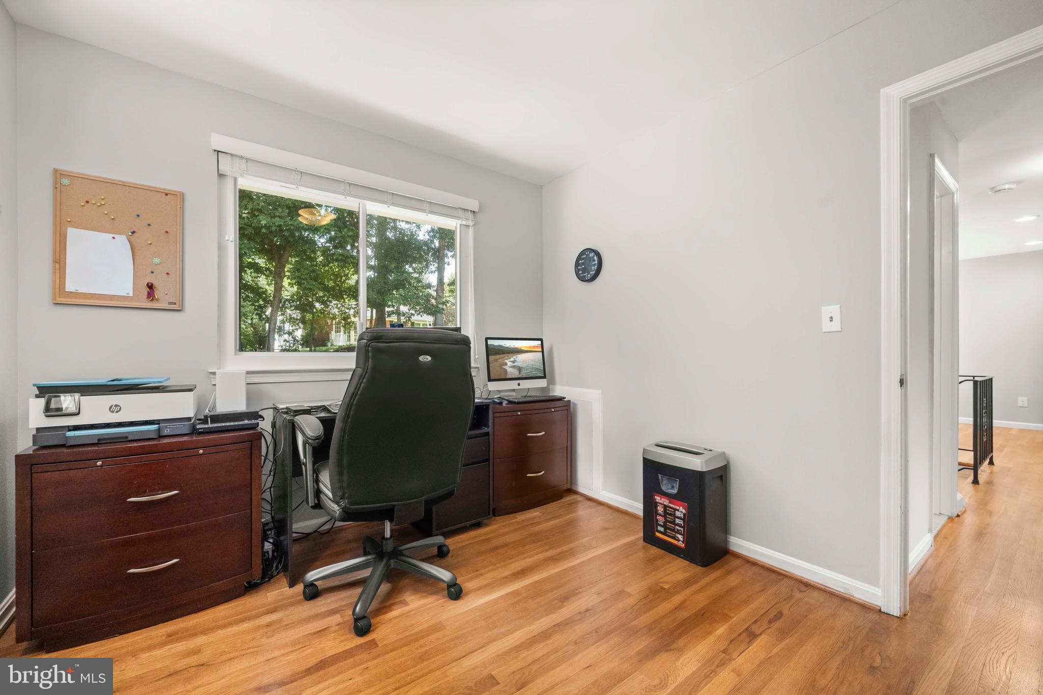 8414 Thames Street Springfield, VA 22151 - Photo 26 of 45 a view of a workspace with furniture and a window