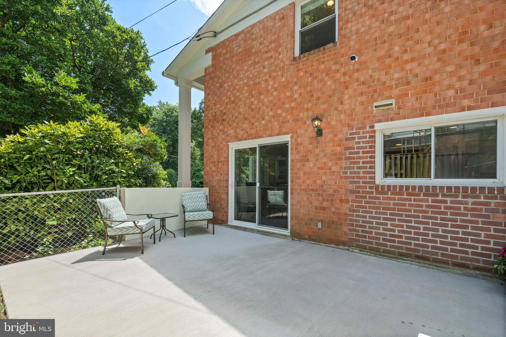8414 Thames Street Springfield, VA 22151 - Photo 41 of 45 a balcony with table and chairs