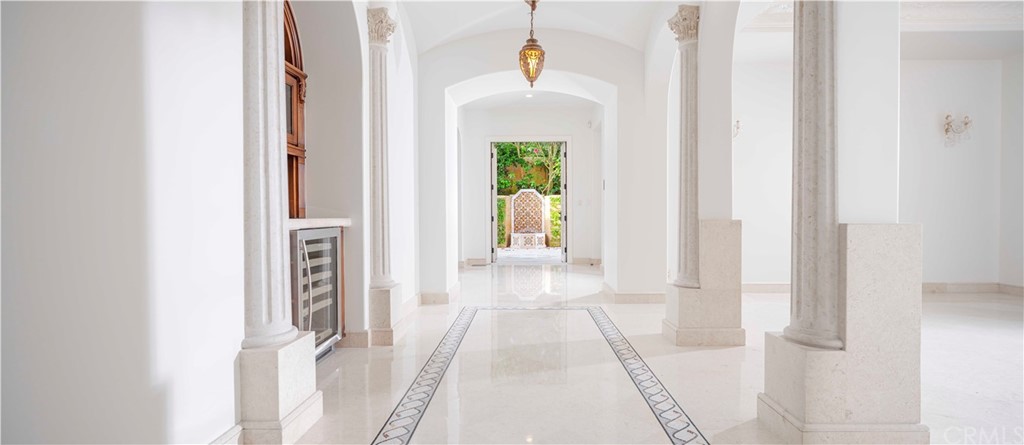 3 Tidecrest Newport Coast, CA 92657 - Photo 16 of 37 a view of a hallway with wooden floor windows