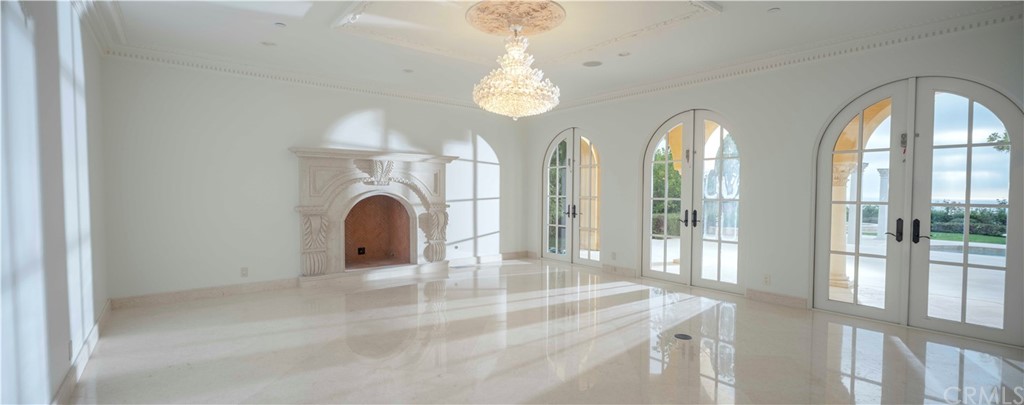 3 Tidecrest Newport Coast, CA 92657 - Photo 18 of 37 a view of a big room with windows and chandelier