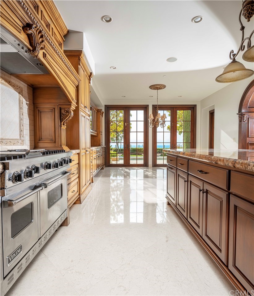 3 Tidecrest Newport Coast, CA 92657 - Photo 20 of 37 a kitchen with stainless steel appliances granite countertop a stove and a sink