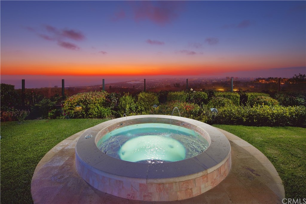 3 Tidecrest Newport Coast, CA 92657 - Photo 3 of 37 a view of a swimming pool with a yard