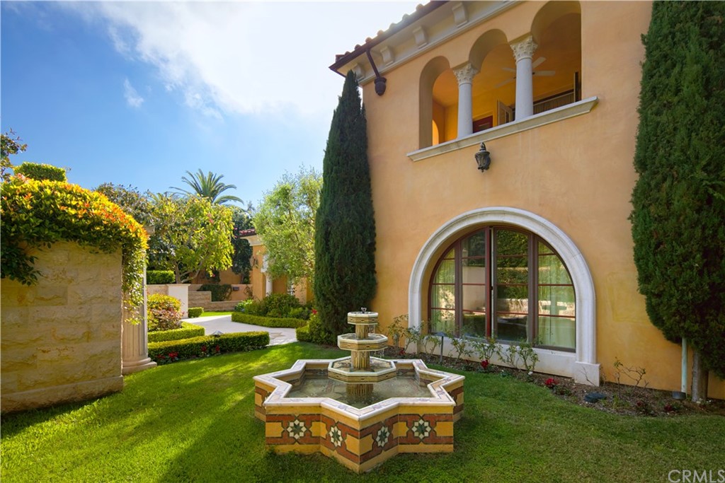 3 Tidecrest Newport Coast, CA 92657 - Photo 9 of 37 a front view of a house with garden