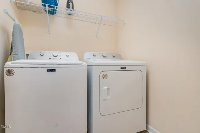 an empty room with closet area