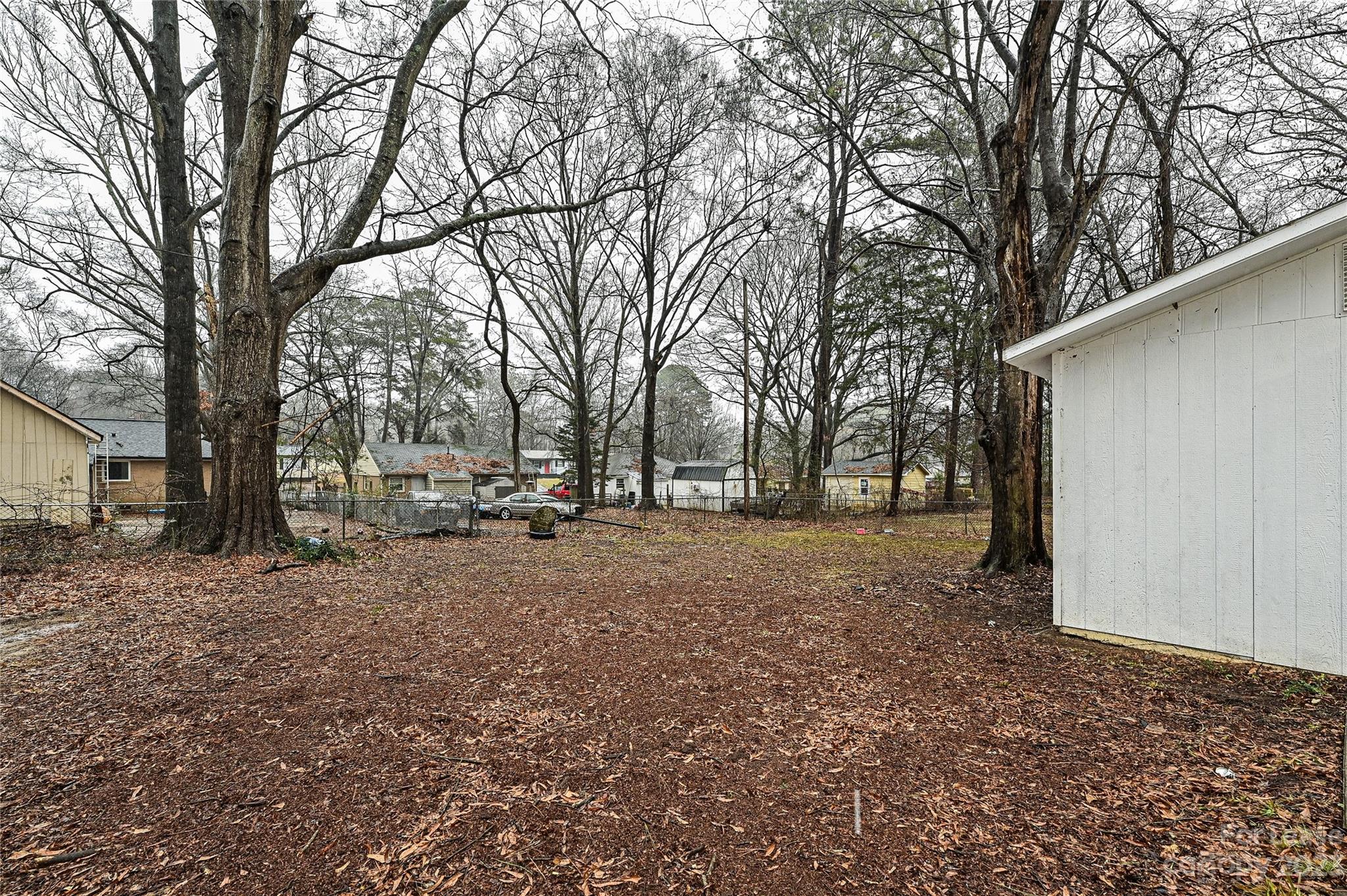 512 West Robinson Street Dallas, NC 28034 - Photo 11 of 17 a view of a yard with a tree