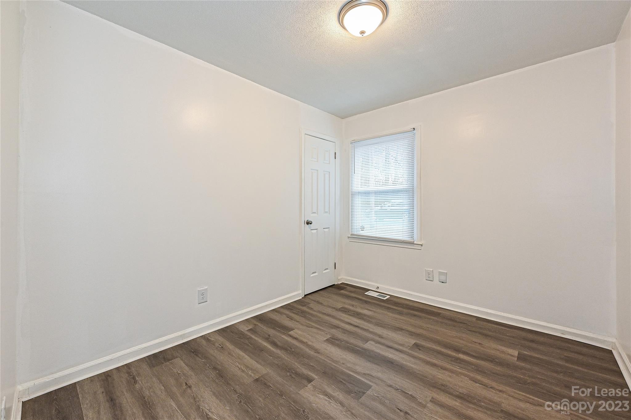 512 West Robinson Street Dallas, NC 28034 - Photo 9 of 17 an empty room with a window