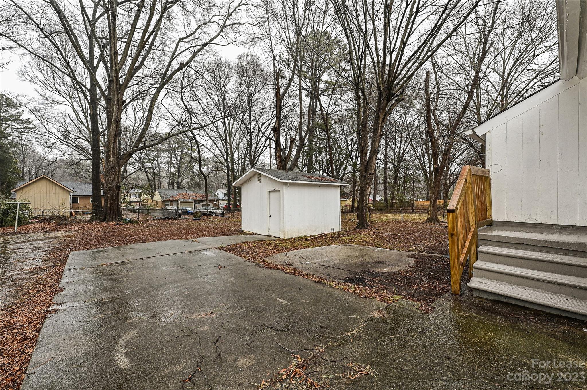 512 West Robinson Street Dallas, NC 28034 - Photo 10 of 17 a view of a house with a yard and garage