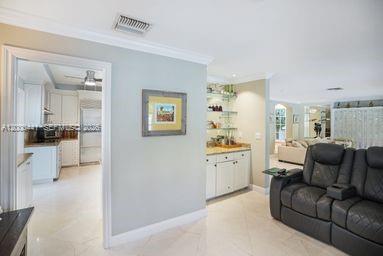 113 South Gordon Road Fort Lauderdale, FL 33301 - Photo 11 of 53 a living room with furniture and kitchen view