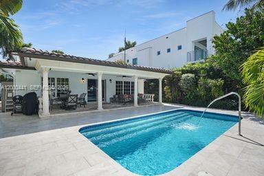 113 South Gordon Road Fort Lauderdale, FL 33301 - Photo 15 of 53 a view of a house with backyard porch and sitting area