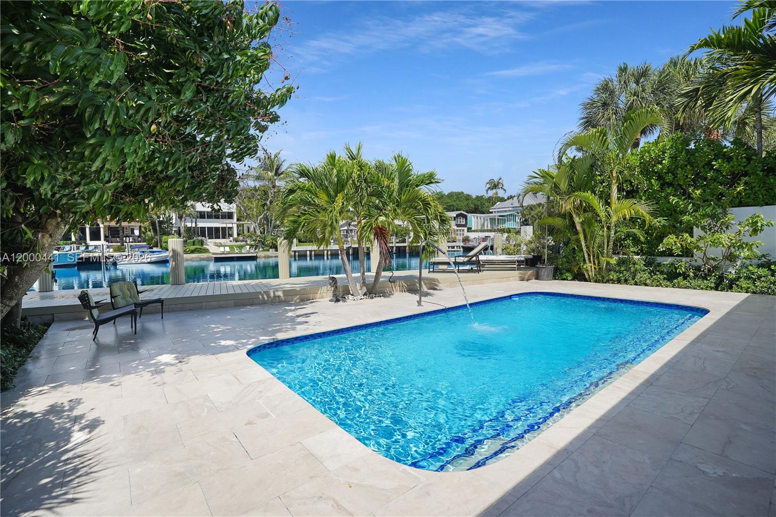 113 South Gordon Road Fort Lauderdale, FL 33301 - Photo 16 of 53 a view of swimming pool with outdoor seating and plants