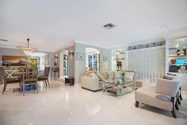 113 South Gordon Road Fort Lauderdale, FL 33301 - Photo 18 of 53 a living room with furniture and white walls