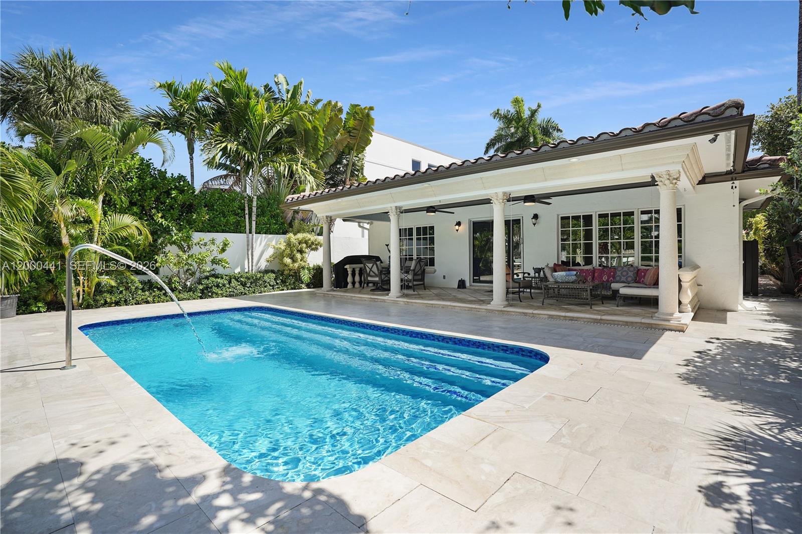 113 South Gordon Road Fort Lauderdale, FL 33301 - Photo 2 of 53 a view of a house with swimming pool