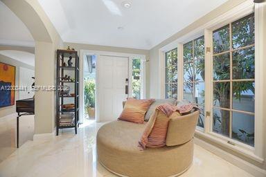 113 South Gordon Road Fort Lauderdale, FL 33301 - Photo 22 of 53 a living room with furniture and large window