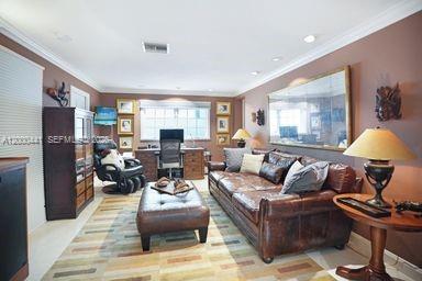 113 South Gordon Road Fort Lauderdale, FL 33301 - Photo 26 of 53 a living room with furniture and a lamp