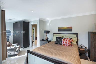 113 South Gordon Road Fort Lauderdale, FL 33301 - Photo 30 of 53 a bedroom with a bed and a couch