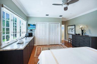 113 South Gordon Road Fort Lauderdale, FL 33301 - Photo 37 of 53 a kitchen with granite countertop a sink and a refrigerator