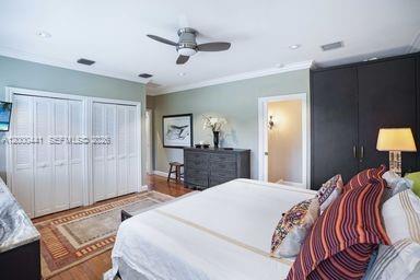 113 South Gordon Road Fort Lauderdale, FL 33301 - Photo 38 of 53 a bedroom with a bed and a dresser in it