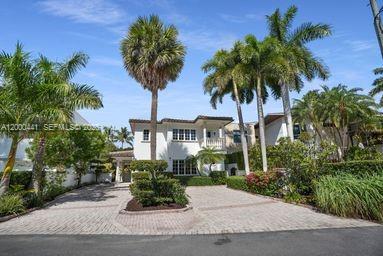 113 South Gordon Road Fort Lauderdale, FL 33301 - Photo 47 of 53 front view of a house with a garden