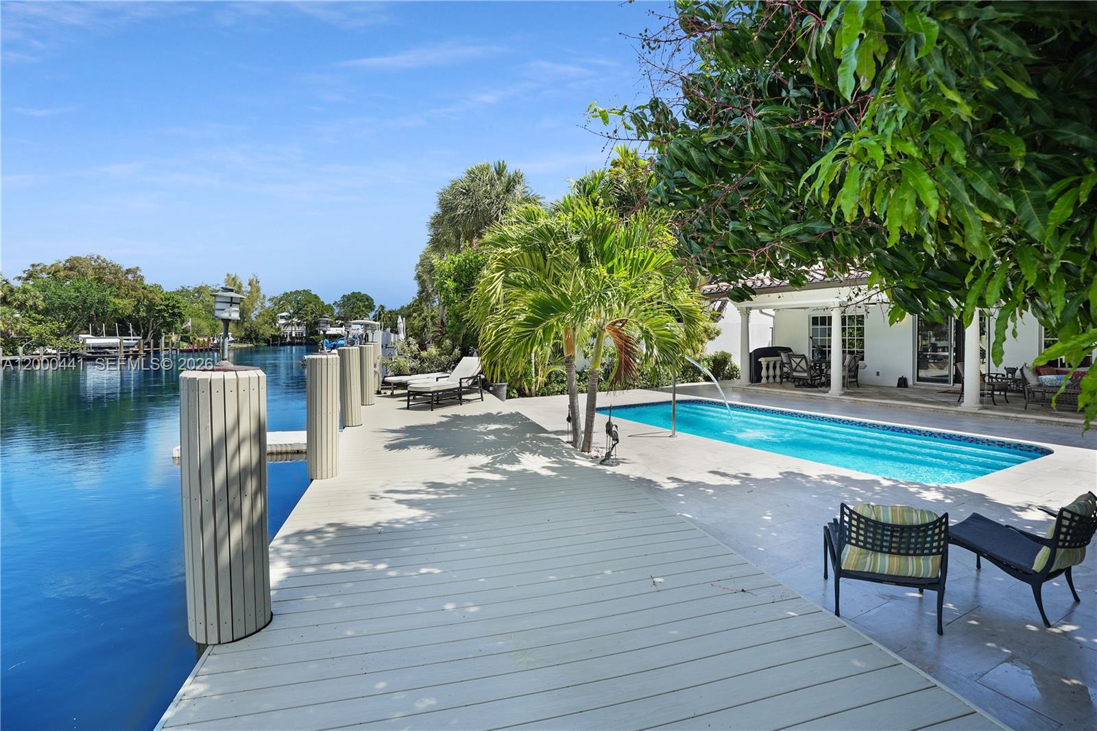 113 South Gordon Road Fort Lauderdale, FL 33301 - Photo 49 of 53 an outdoor space with lounge chairs