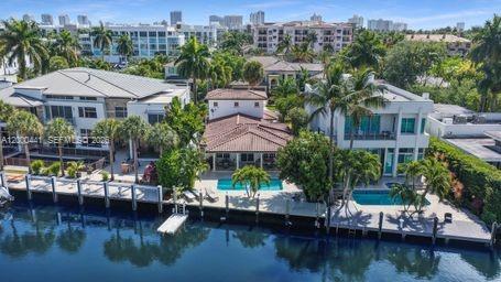 113 South Gordon Road Fort Lauderdale, FL 33301 - Photo 51 of 53 a view of a lake with a house in the background