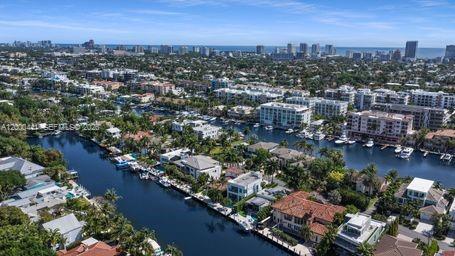 113 South Gordon Road Fort Lauderdale, FL 33301 - Photo 52 of 53 an aerial view of a city with lots of residential buildings lake and ocean view