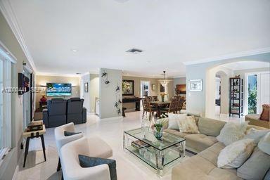 113 South Gordon Road Fort Lauderdale, FL 33301 - Photo 8 of 53 a living room with furniture and a view of kitchen