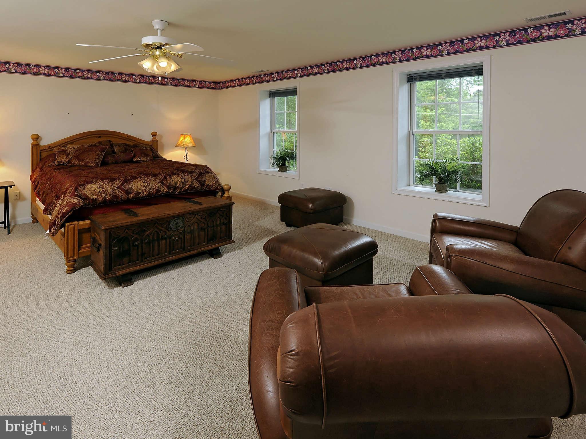 5002 Howellsville Road Front Royal, VA 22630 - Photo 10 of 21 a bedroom with furniture and a window