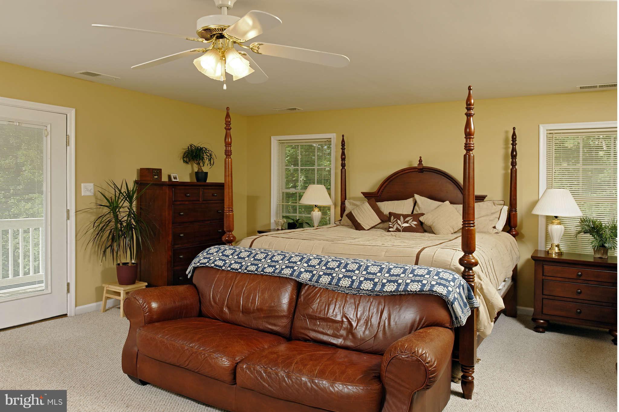 5002 Howellsville Road Front Royal, VA 22630 - Photo 5 of 21 a bedroom with a bed window and a dresser
