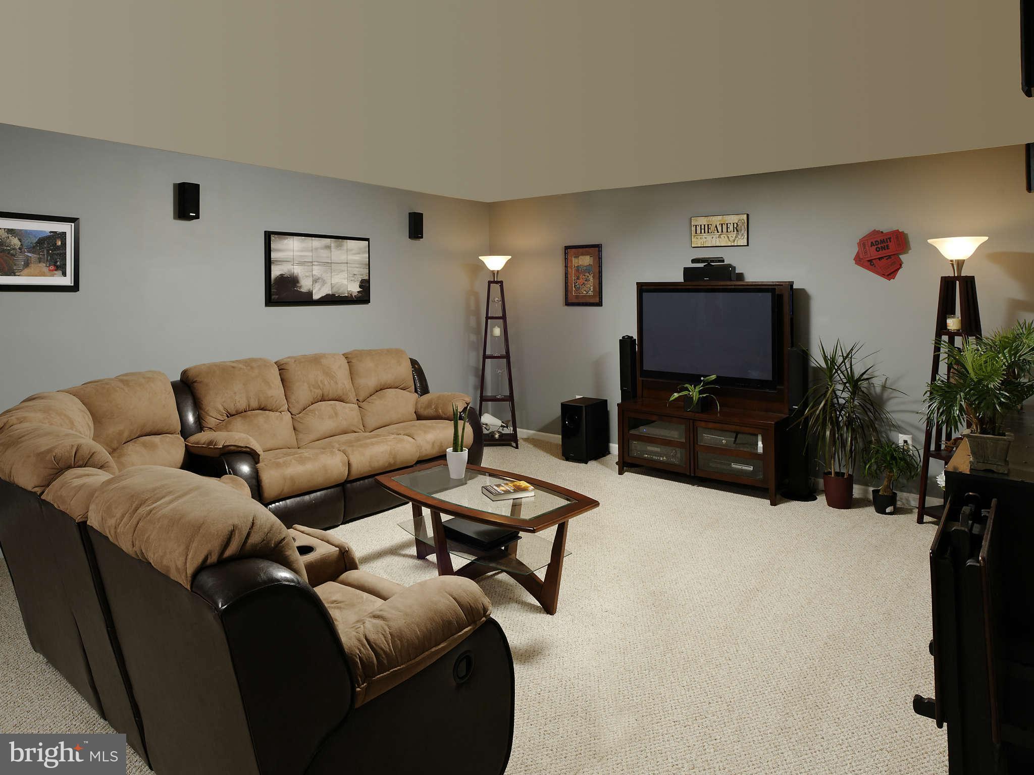 5002 Howellsville Road Front Royal, VA 22630 - Photo 9 of 21 a living room with furniture and a flat screen tv