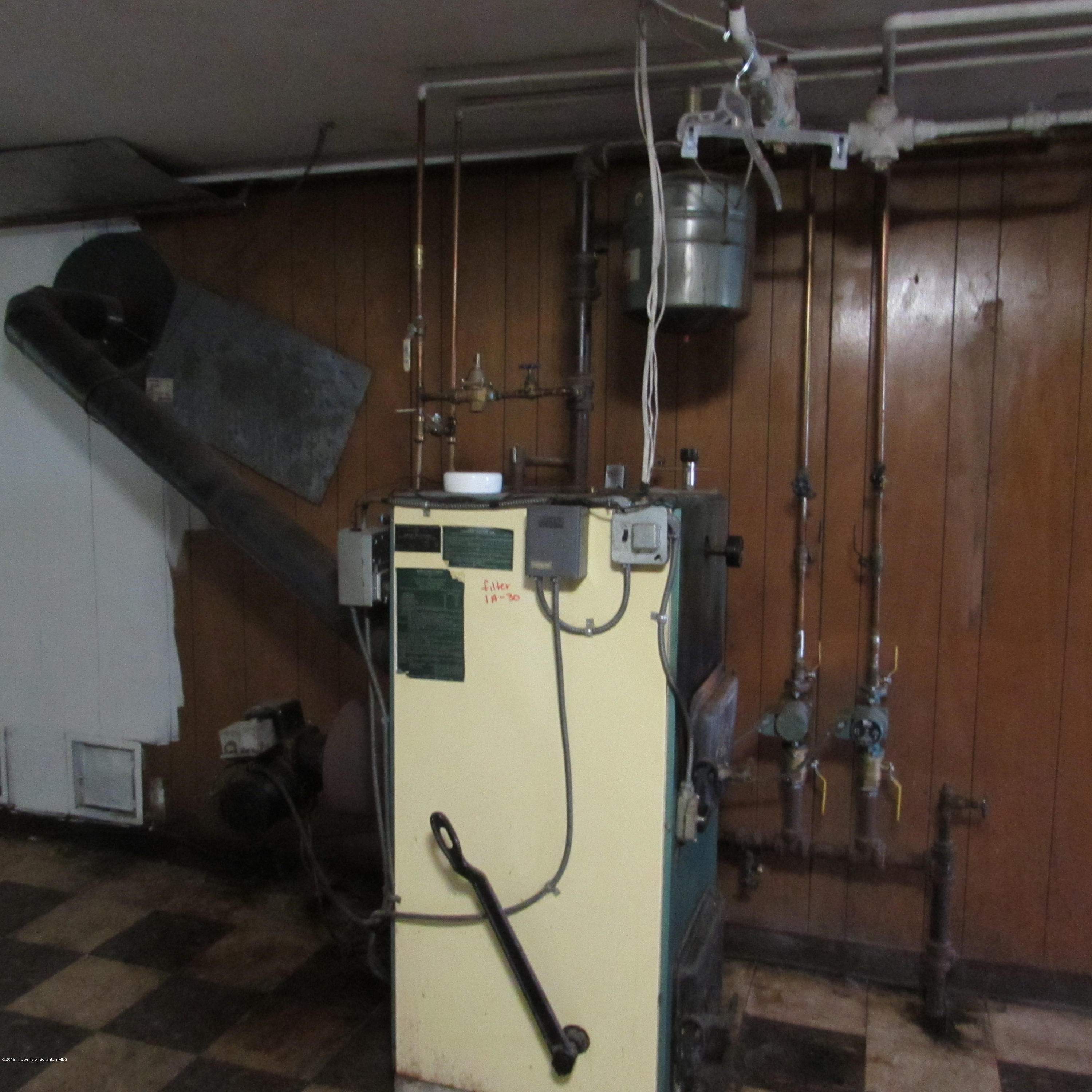171 Sawmill Road Tunkhannock, PA 18657 - Photo 18 of 20 a close view of water heater room
