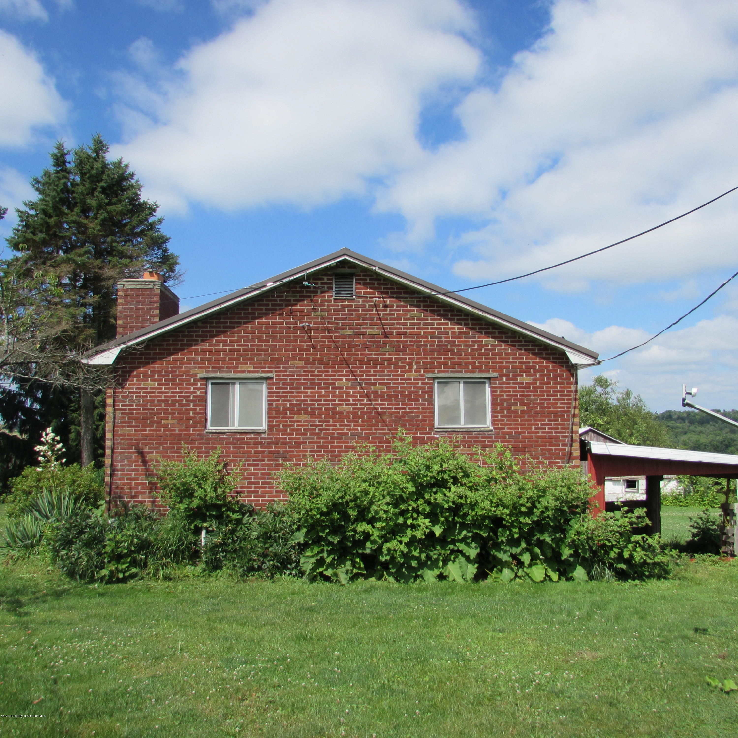 171 Sawmill Road Tunkhannock, PA 18657 - Photo 3 of 20 a view of a house with a yard