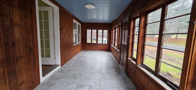 a view of gallery with windows