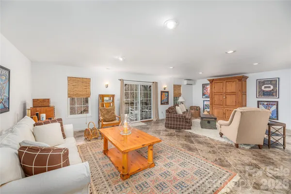 a living room with furniture and a table