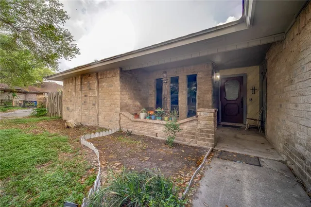 a house view with a backyard space