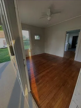 a view of balcony and front door