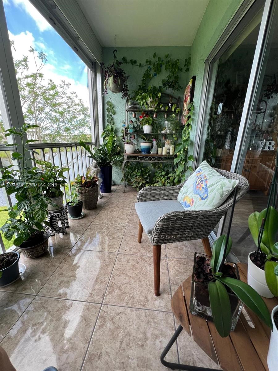 9880 Marina Boulevard, Unit 1516 Boca Raton, FL 33428 - Photo 23 of 32 a view of outdoor space yard and patio