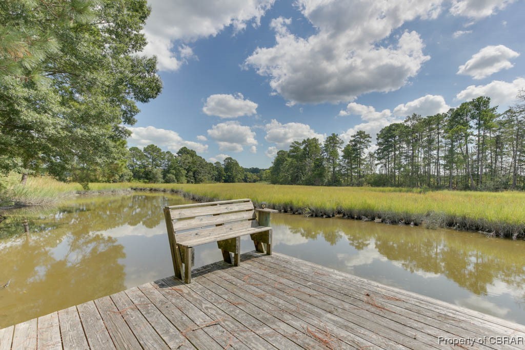 2584 Starvation Road Gloucester, VA 23061 - Photo 34 of 38 View of dock featuring a water view